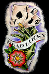 painted image of a Green hand holding playing cards with tattoo style banner reading Dead Lucky.