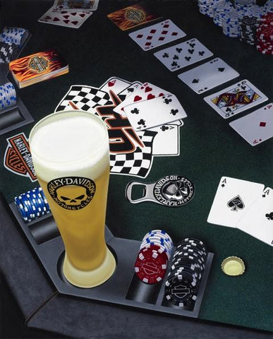 Painted image by Scott Jacobs of a beer glass with Harley Davidson logo sitting on a poker table with playing cards and poker chips in the background.